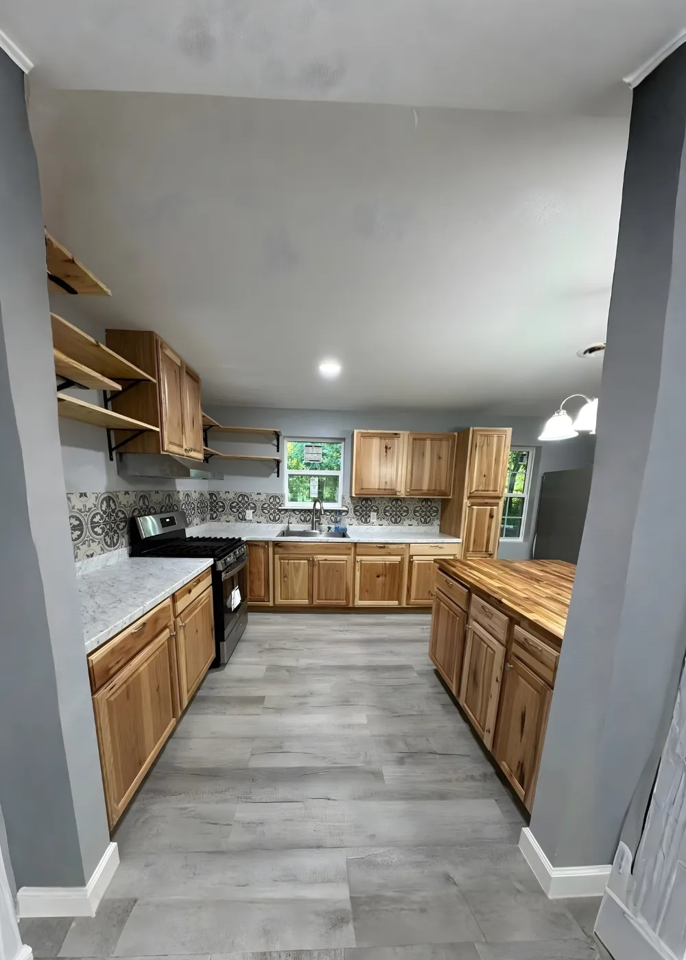 Finished kitchen with new cabinets and flooring