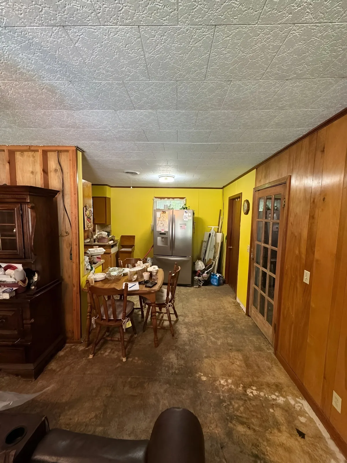 Kitchen and living area before remodeling