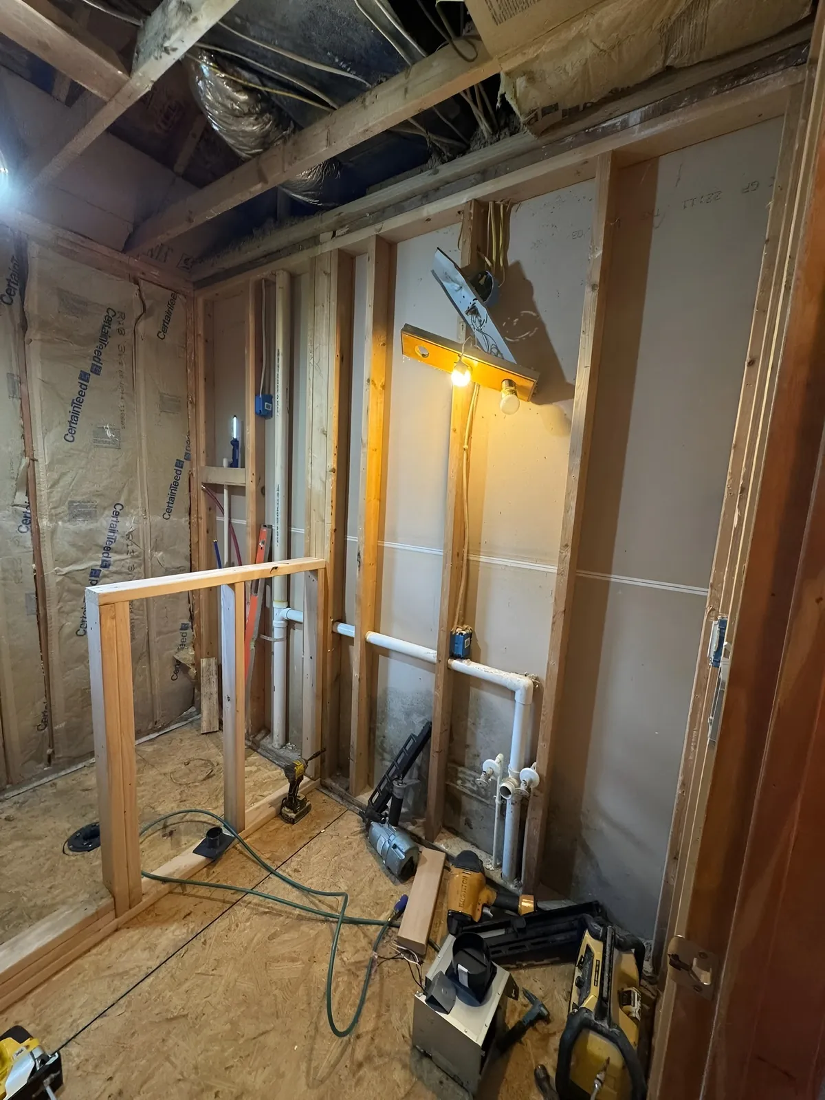 Bathroom before the rebuild with heavy floor damage